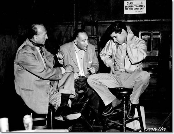 Michael Curtiz, Hal Wallis and Elvis Presley on the set of King Creole.